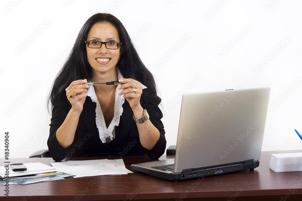 Beautiful business woman on a workplace Beautiful business woman on a workplace