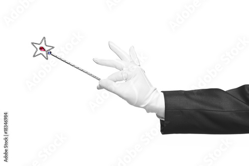 Holding a magic wand isolated on white background