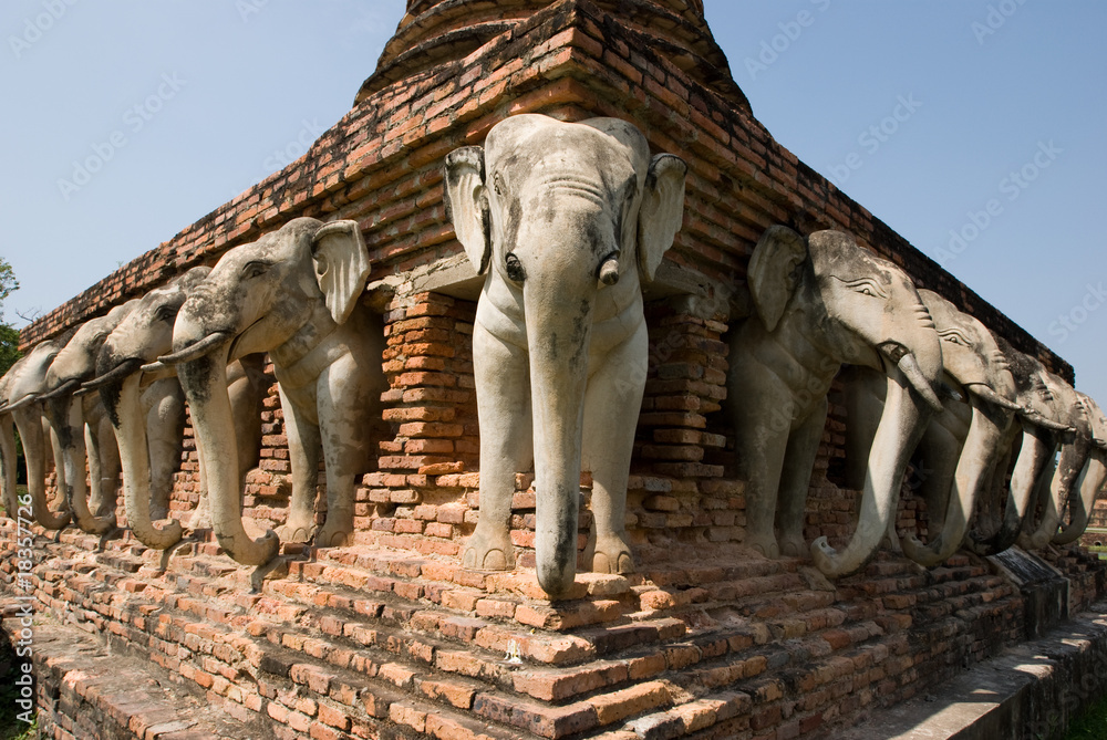 Fototapeta premium Elephant statues on Buddhist stupa,Thailand