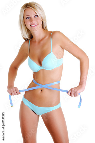woman with a beauty body and measurement tape