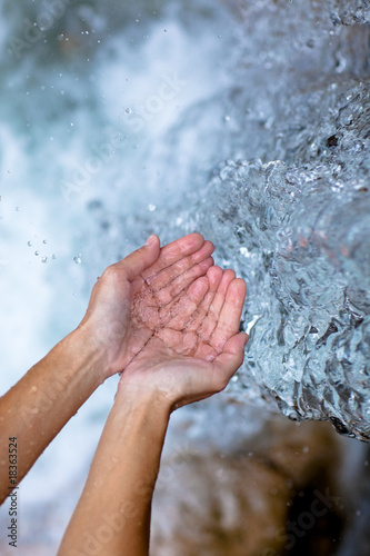 female hands and water like ice