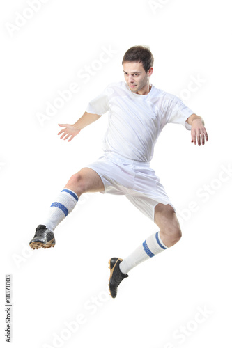 Football player in jump isolated against white