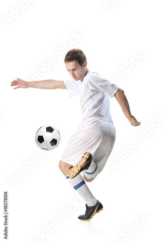 Football player with ball isolated against white © Ljupco Smokovski