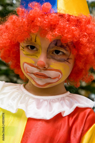 Fototapeta Naklejka Na Ścianę i Meble -  The boy wearing clown