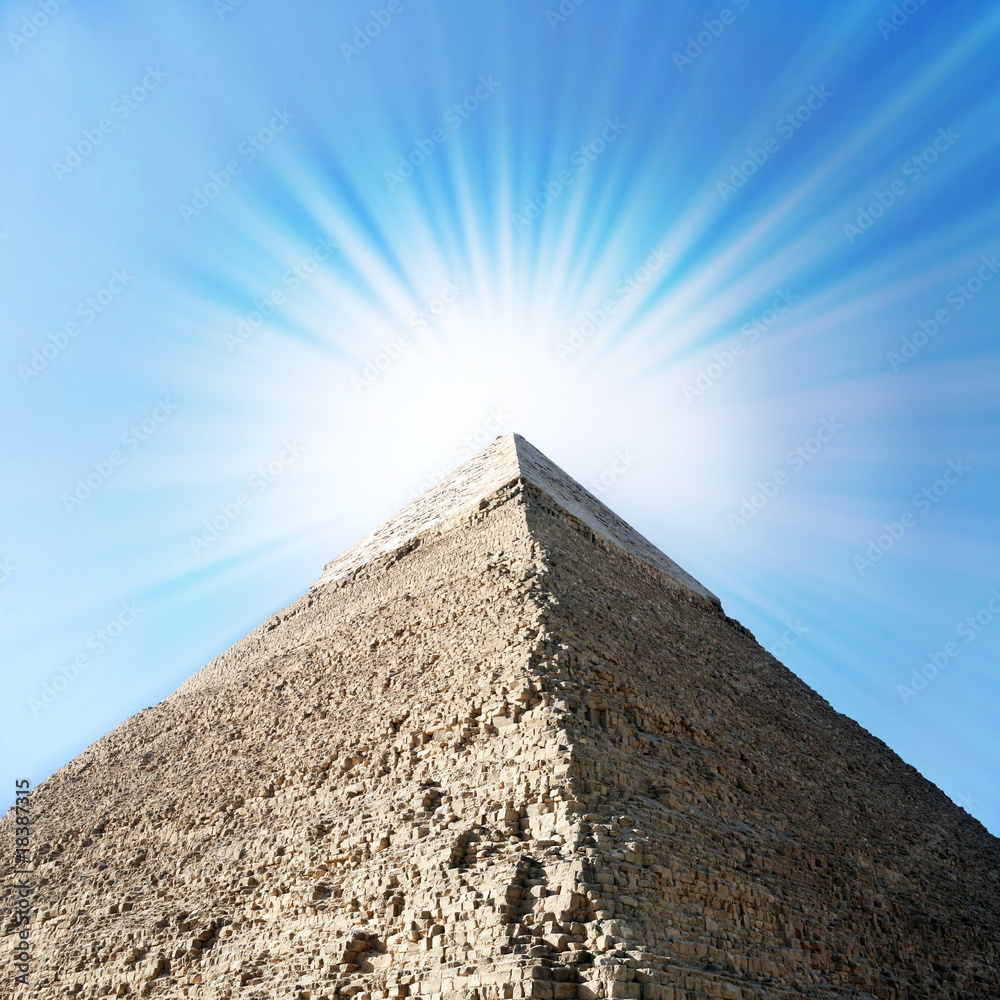 Fototapeta premium Egyptian pyramids with sun beams.