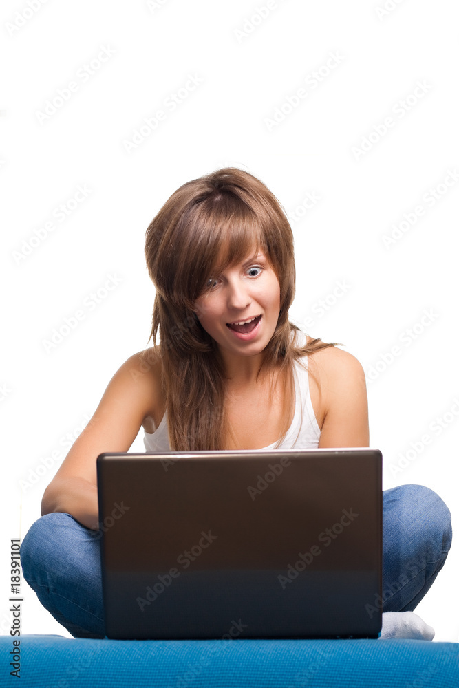 Young girl surprised with laptop Young girl surprised with laptop
