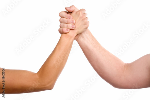 Man and woman arm wrestling
