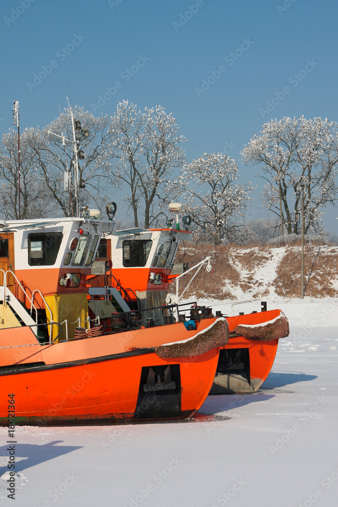 keelboats on the frozen river