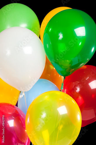 Party balloons on black