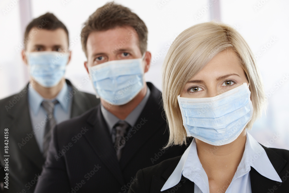 Business people fearing h1n1 virus Business people fearing h1n1 virus