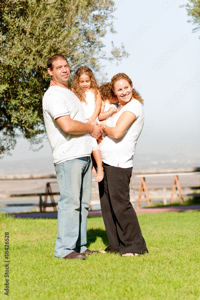 Fototapeta premium Full length family lifestyle portrait