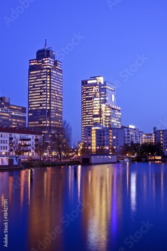 Photography Amsterdam skyline by night in the Netherlands