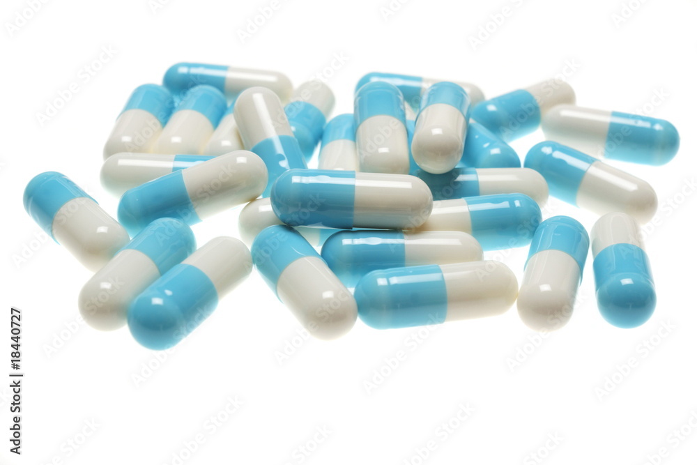 blue pills on white background