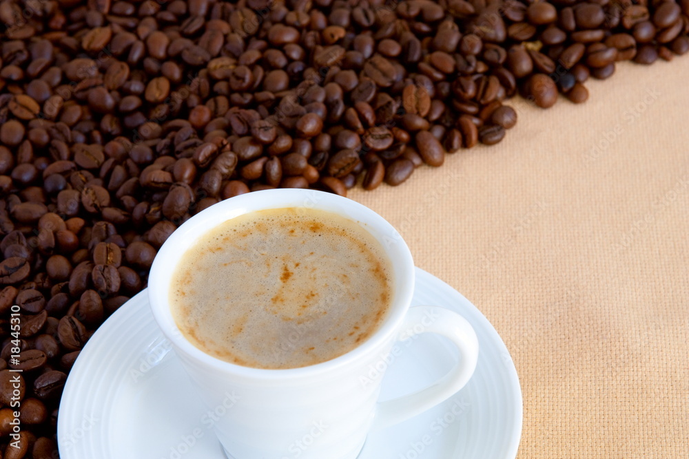 cup with coffee and grain