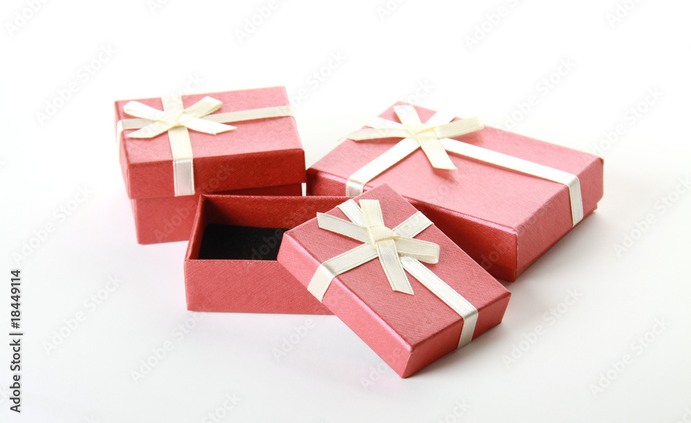 Obraz premium Three terracotta festive boxes over white