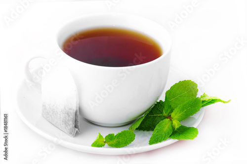 Cup of black tea with mint
