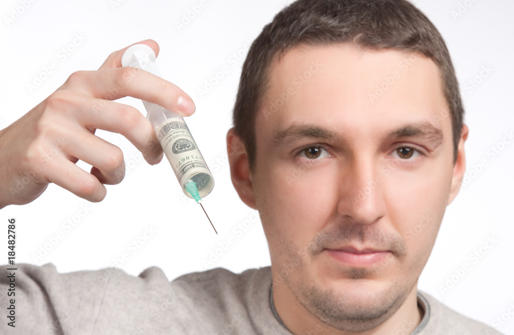 man pointing wiyh money syringe closeup man pointing wiyh money syringe closeup