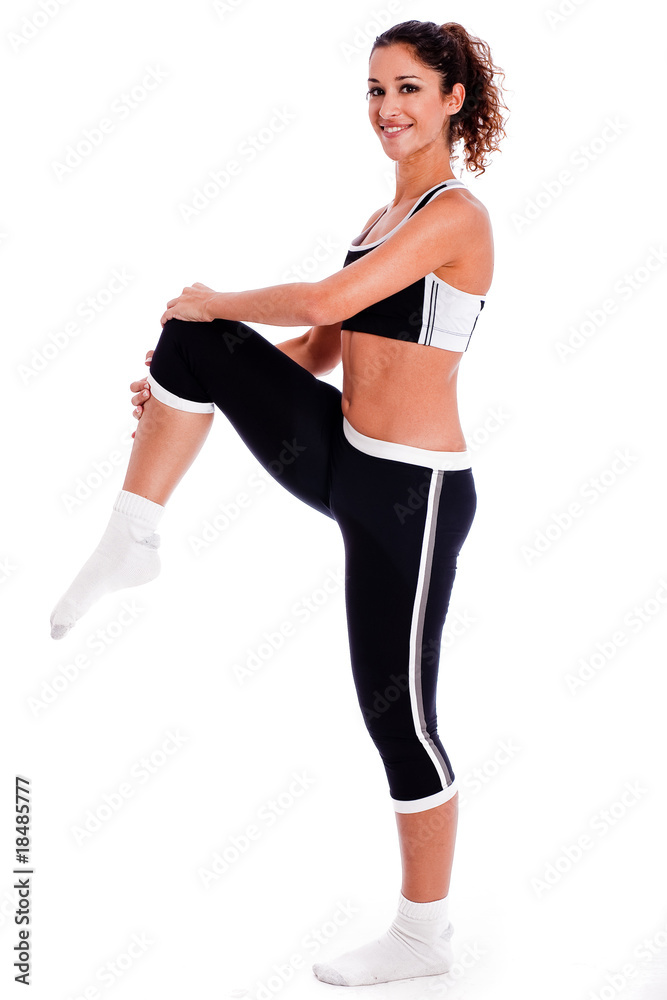 young woman making exercise on the studio young woman making exercise on the studio
