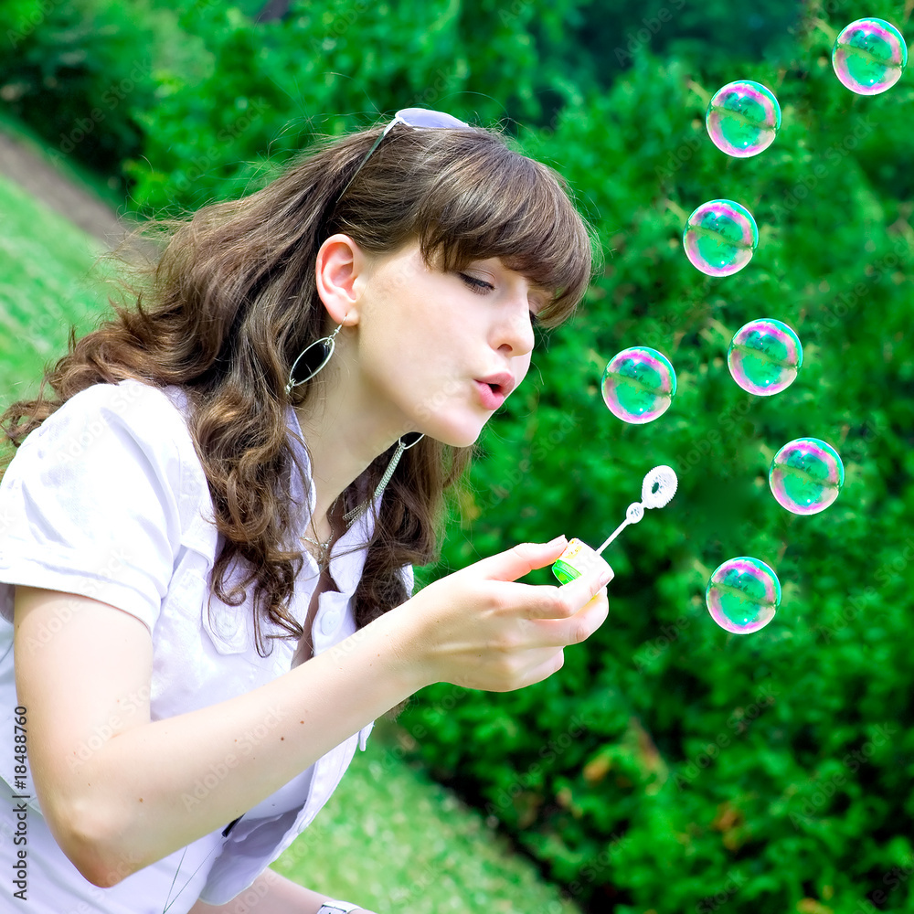 smile teen blowing soap bubbles smile teen blowing soap bubbles