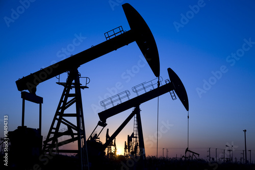 Silhouette of oil pump jacks