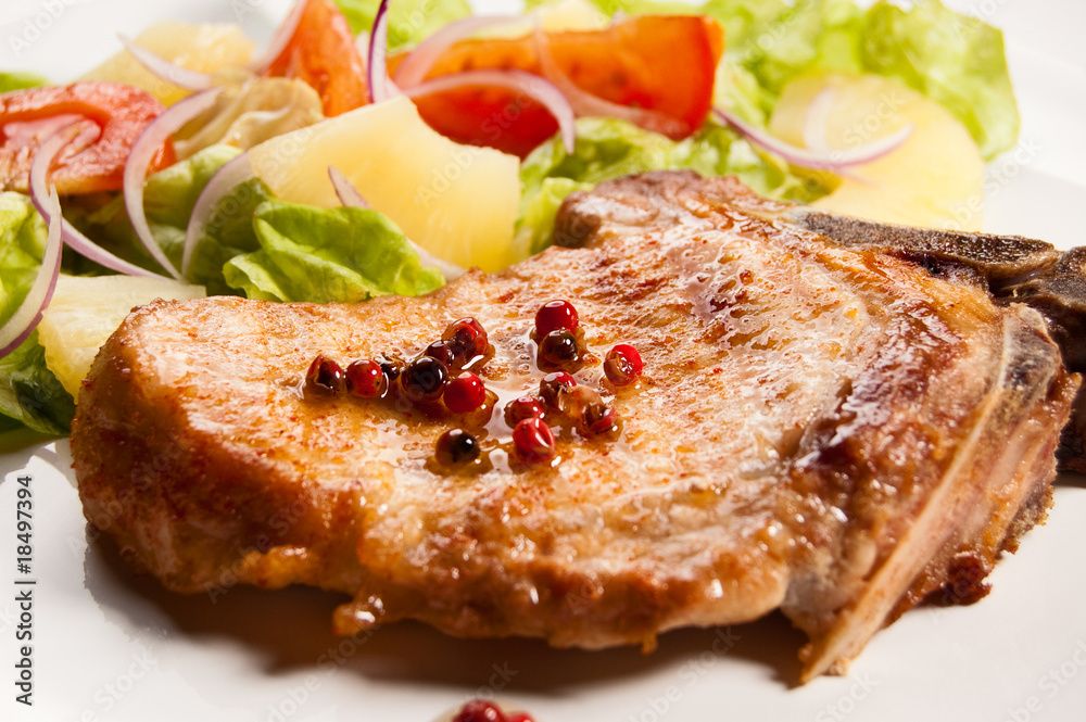 Grilled meat with boiled potatoes and vegetable salad Grilled meat with boiled potatoes and vegetable salad