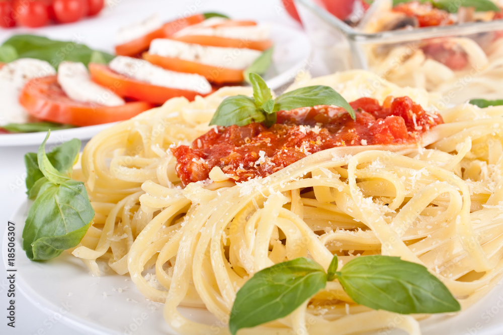 Linguine pasta with fresh tomato sauce and basil Linguine pasta with fresh tomato sauce and basil