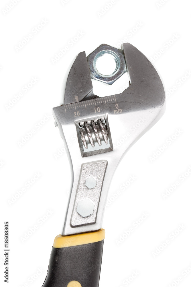 Obraz premium Wrench and nut on white background