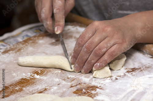hands with a knife