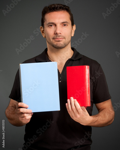 Man presenting two objects
