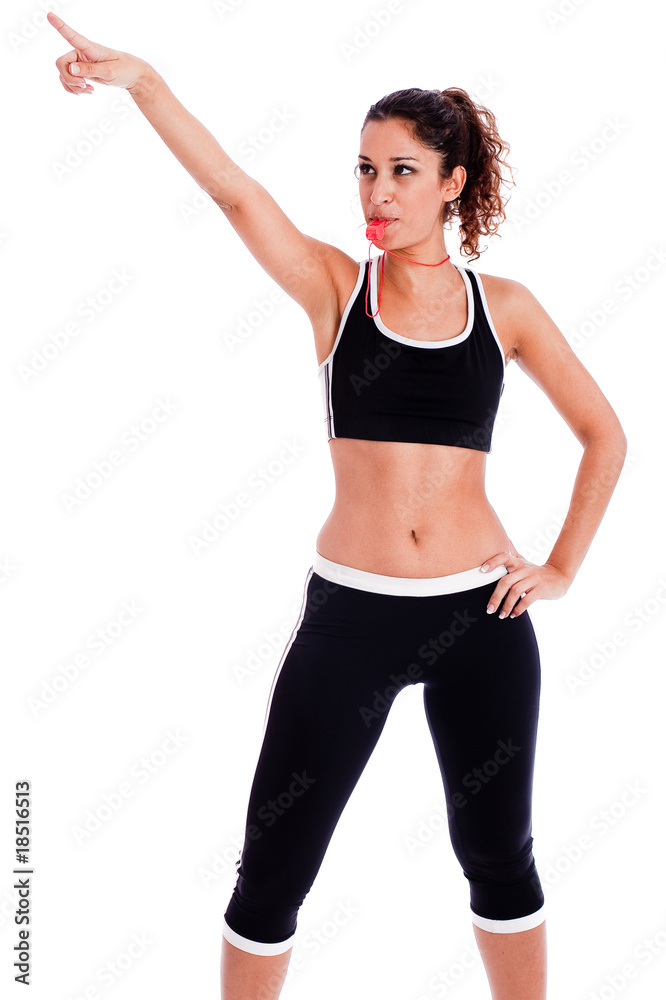 Young fitness woman pointing up the right corner Young fitness woman pointing up the right corner