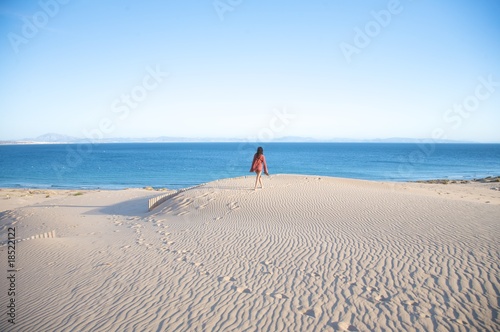 hiking on tarifa sand dunes photo