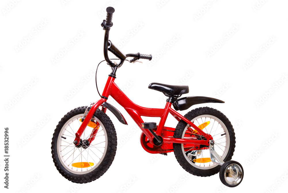 New red children's bicycle on white
