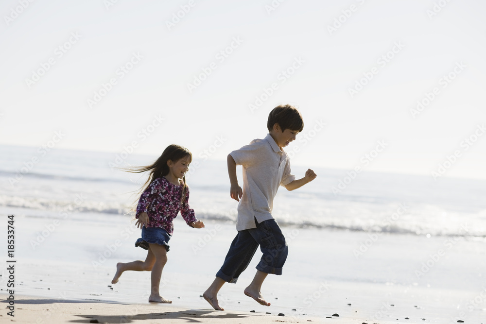 Fototapeta premium Kids Running on Beach