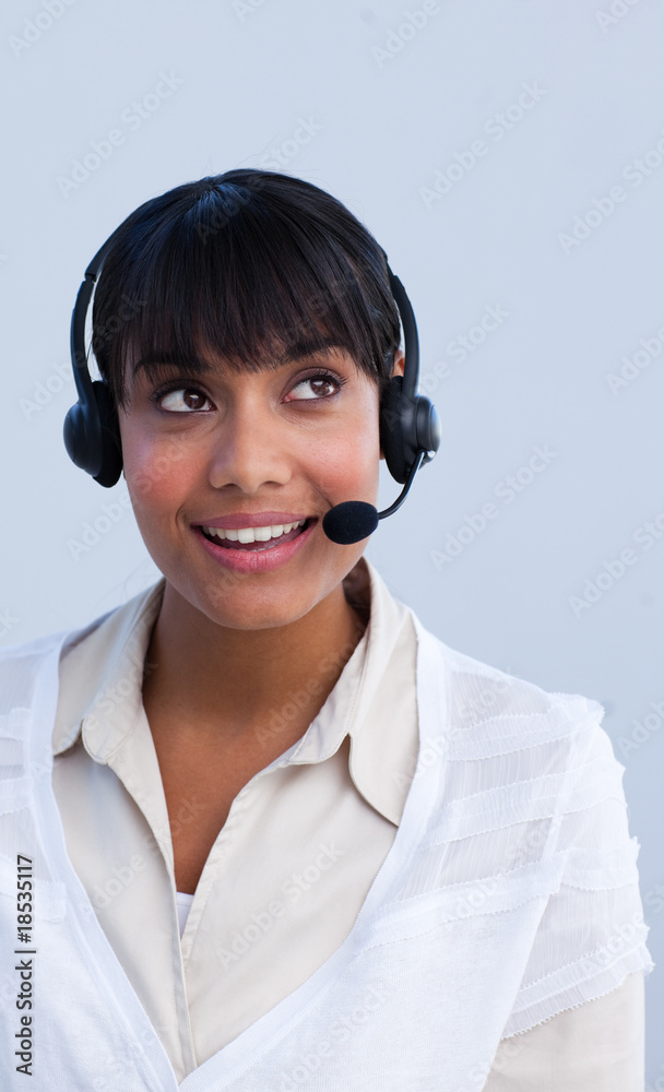 Beautiful ethnic businesswoman working in a call center Beautiful ethnic businesswoman working in a call center