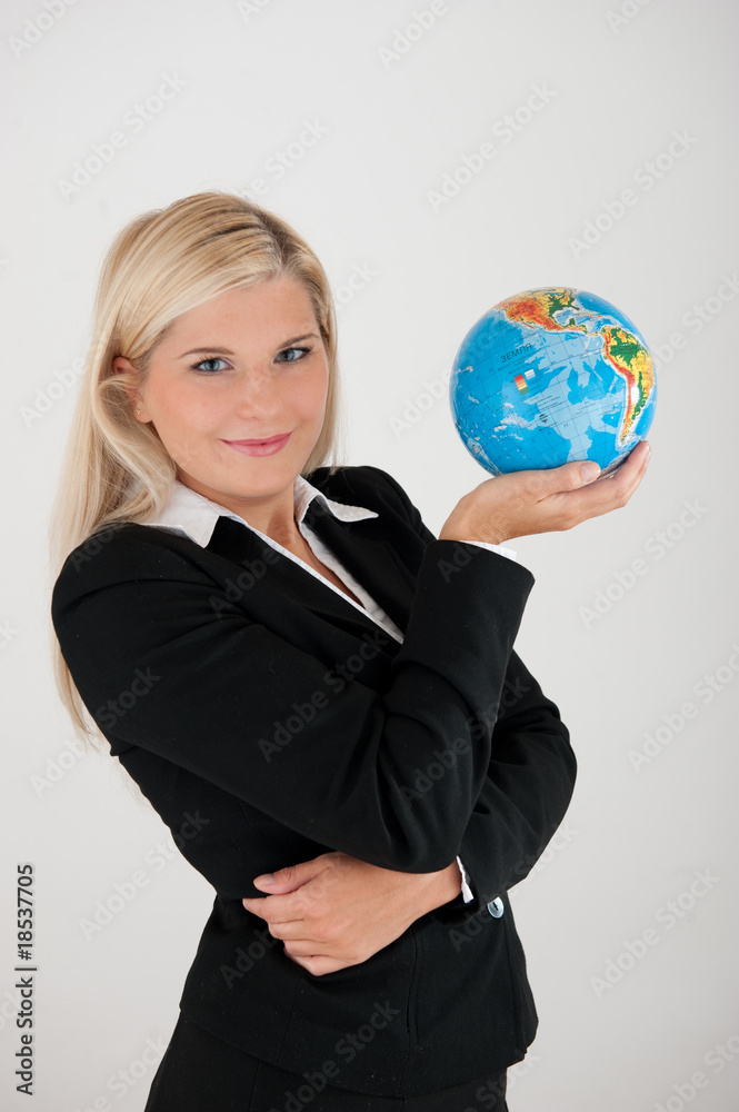 Young business woman with a globe Young business woman with a globe