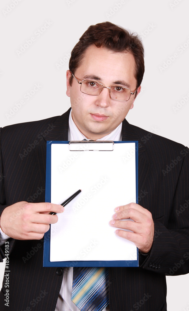 Young businessman with clipboard Young businessman with clipboard