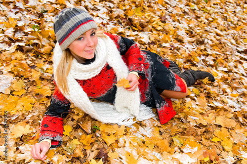 portrait of young smiling woman on the ground