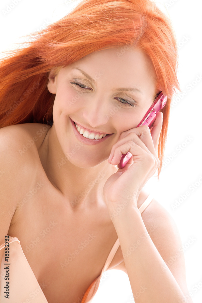 happy redhead woman with cell phone happy redhead woman with cell phone