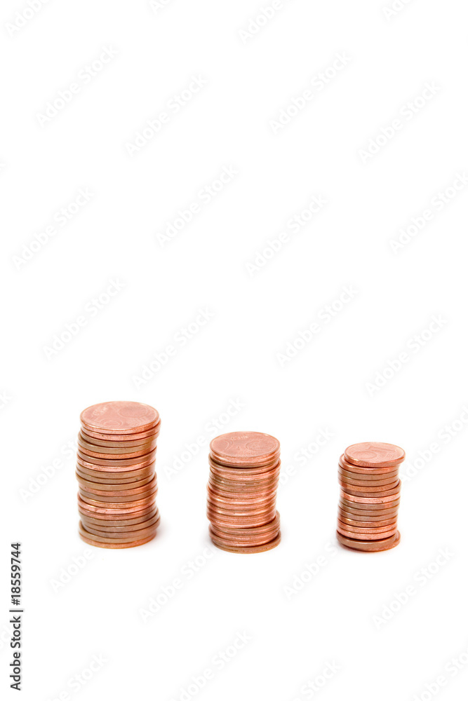 towers of golden coins isolated on white towers of golden coins isolated on white