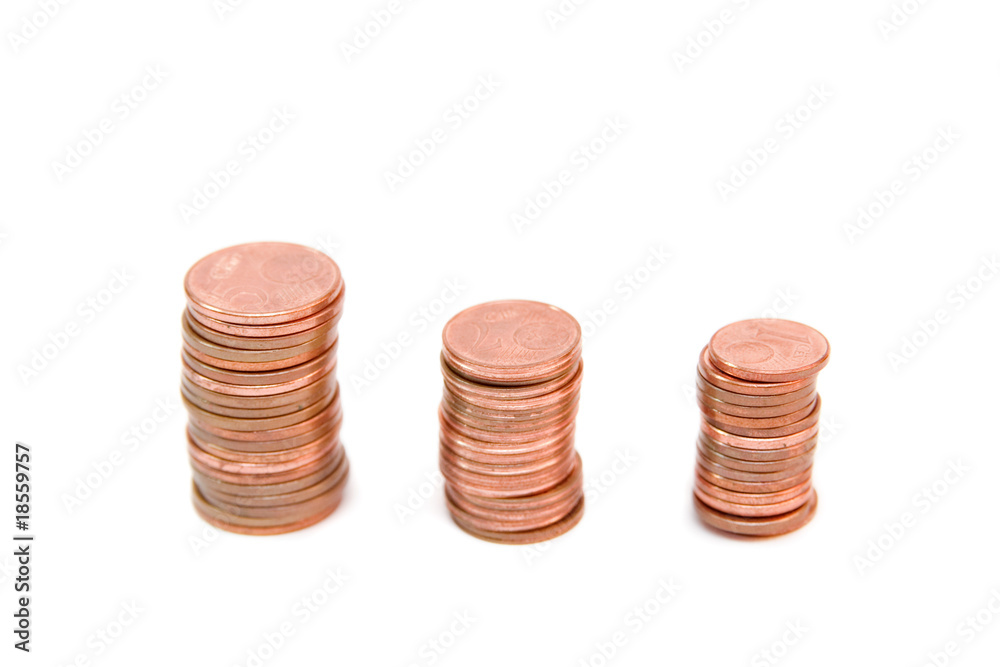 towers of golden coins isolated on white towers of golden coins isolated on white