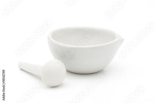 White mortar and pestle over white background
