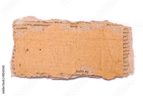 Wallpaper Mural Ripped piece of cardboard on white background Torontodigital.ca