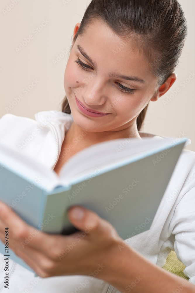 Students - Female teenager reading book