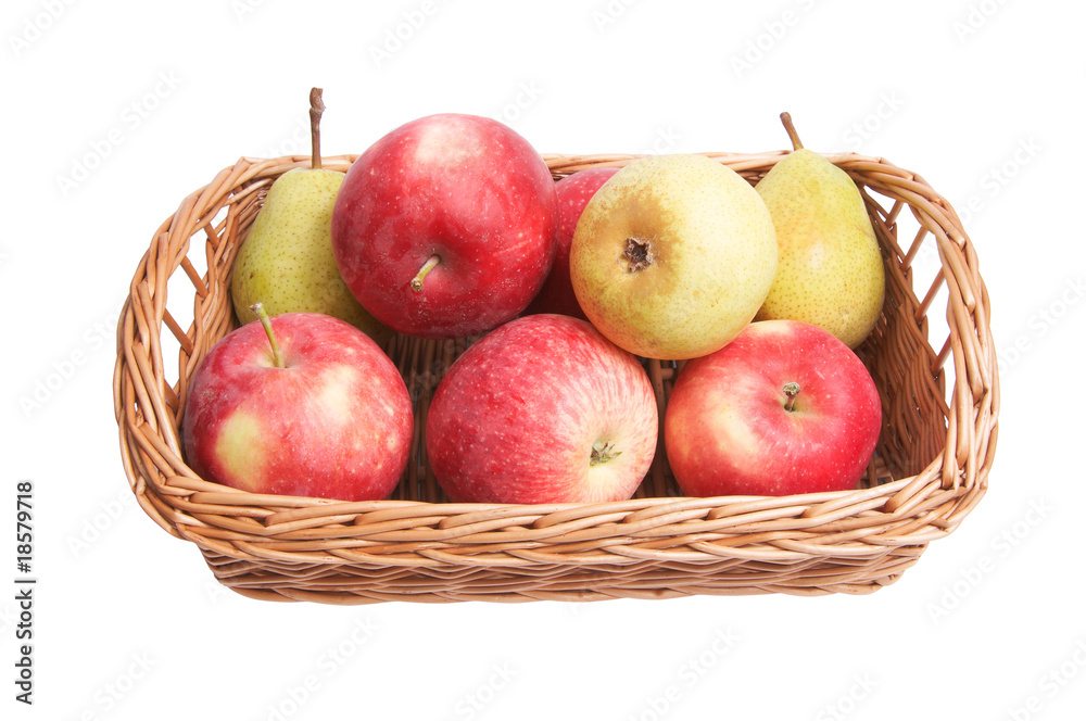 Autumnal basket with fruits on a white Autumnal basket with fruits on a white