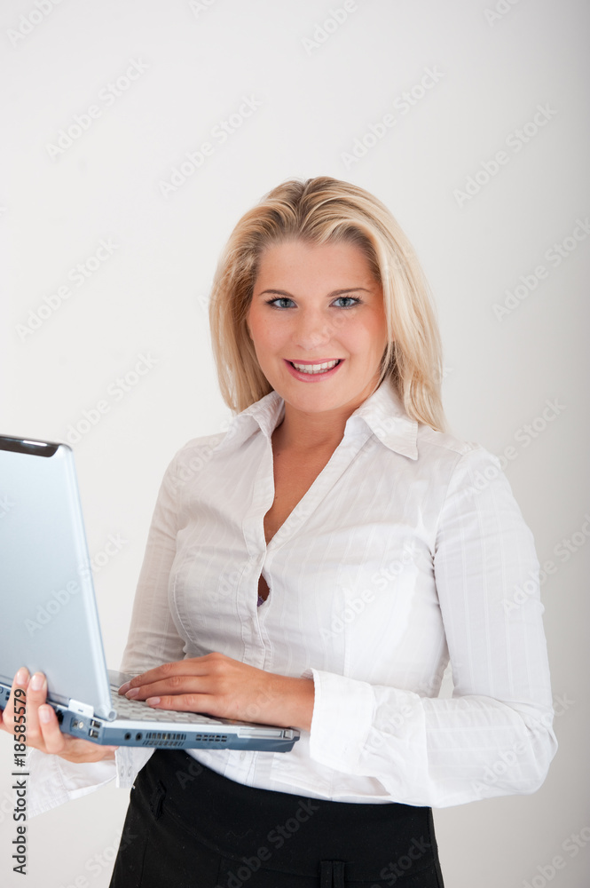 young beautiful  office secretary with laptop