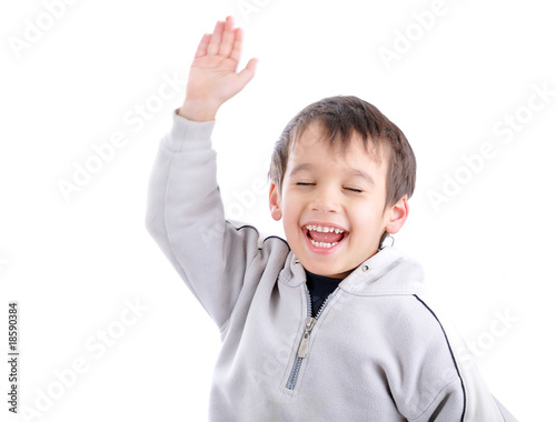 Positive child isolated, laughing and gesturing