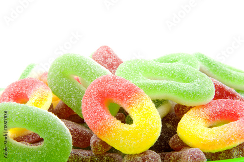 Colorful sugar candy sweets over white background