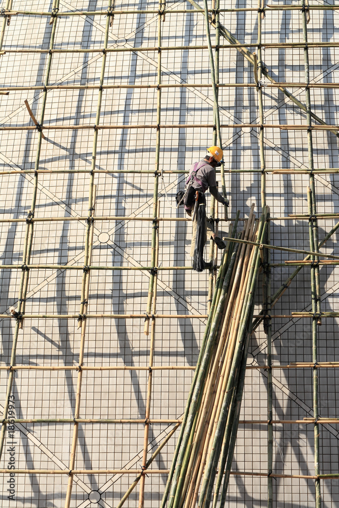 Fototapeta premium building a scaffold with bamboo in Hong Kong