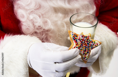 Santa with cookie and milk photo