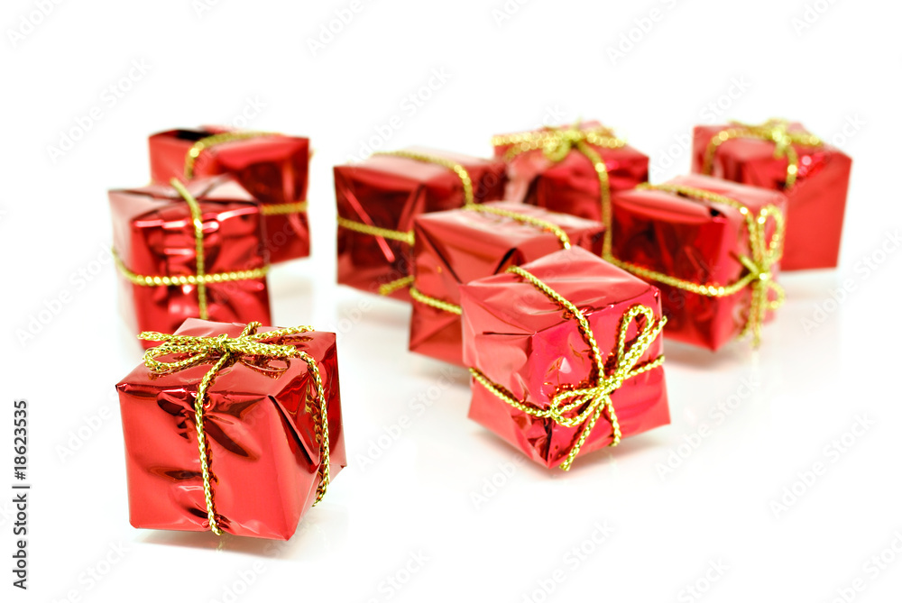 Red gift boxes with gold ribbon Red gift boxes with gold ribbon